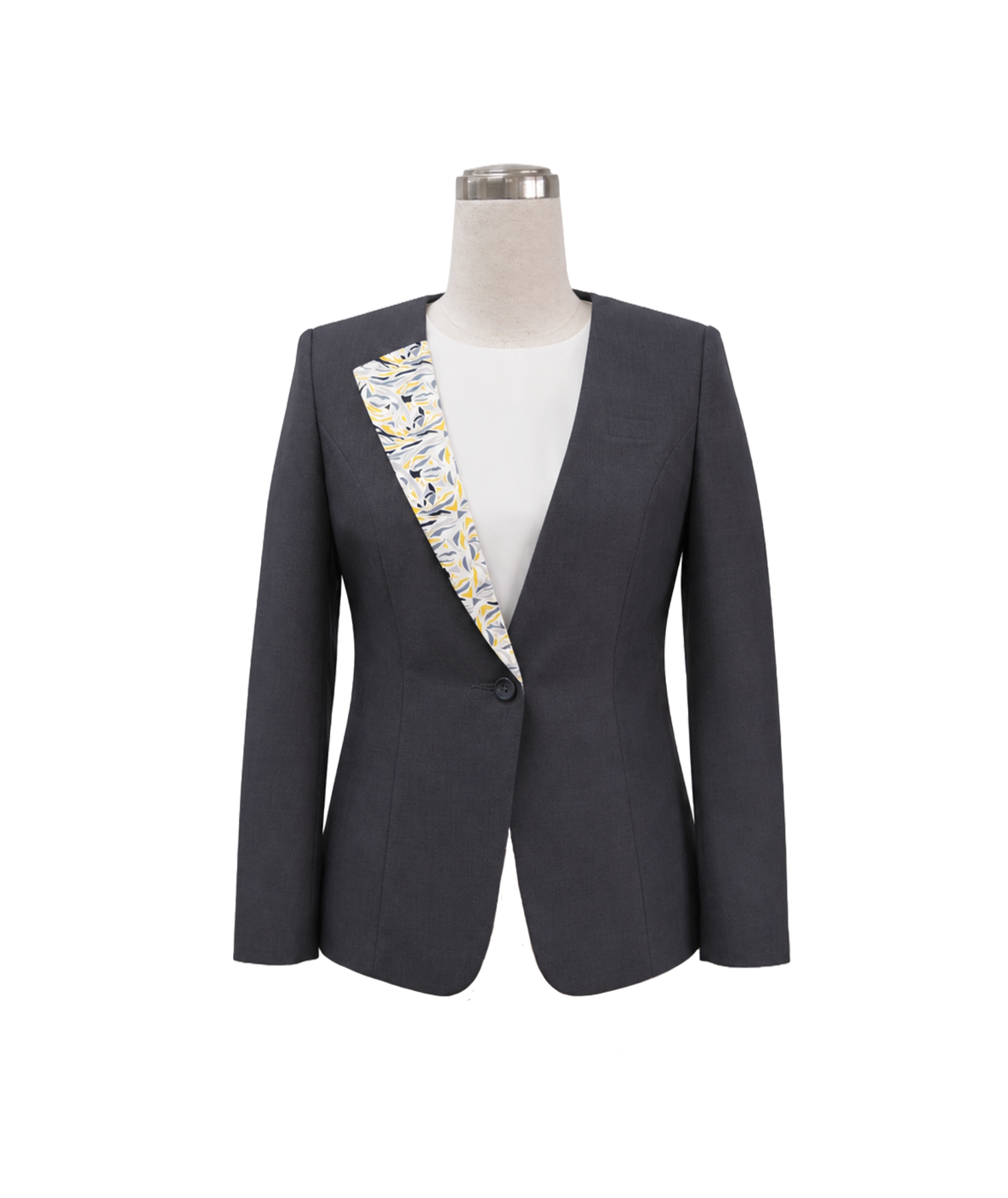 modoleen-banking-corporate-suit-jacket-yellow-accent.jpg Women's single-button corporate suit blazer in dark charcoal grey featuring a yellow and grey abstract leaf printed lapel facing and structured waist contouring, designed for bank tellers and financial consultants by Modoleen Singapore.
