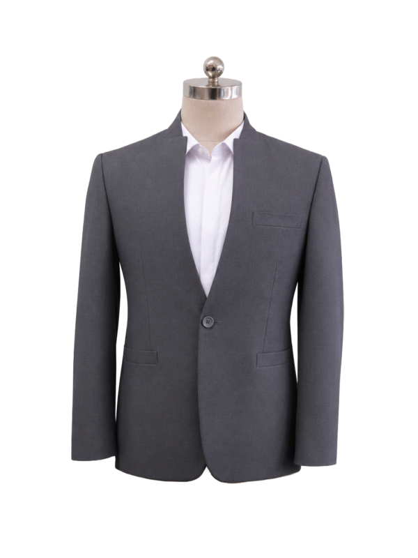 Men's corporate suit jacket in medium grey featuring a tailored V-neck cutaway standing collar, single chest welt pocket, and lower welt pockets, styled over a white collared shirt, designed by Modoleen Singapore for corporate leadership and hospitality uniform programs.