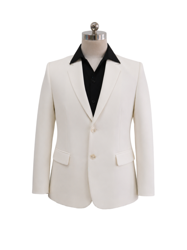 Men's classic two-button corporate suit blazer in cream ivory featuring tailored notch lapels, waist flap pockets, and matching cream buttons, styled over an open-collar black shirt, designed by Modoleen Singapore for corporate leadership, hospitality, and front-of-house uniform programs.