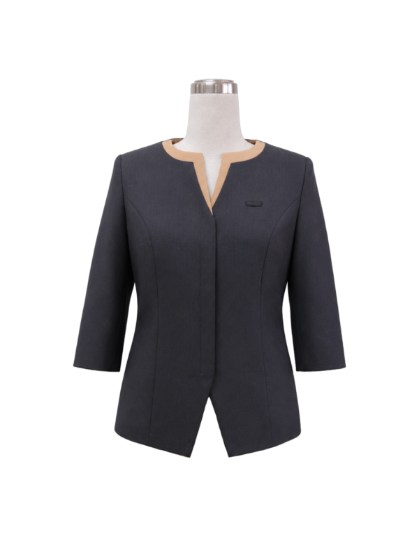 Women's tailored 3/4-sleeve corporate tunic in dark charcoal grey featuring a tan crossover split-neck collar band, concealed front placket, and asymmetric notched hem, designed by Modoleen Singapore for office wear and hospitality uniform programs.