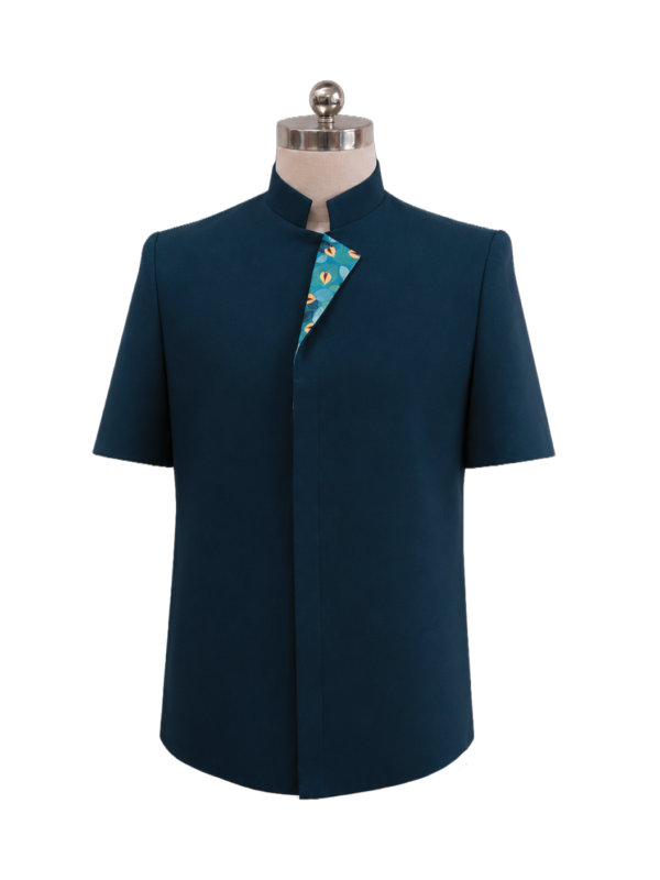 Men's corporate short-sleeve standing collar tunic in dark teal featuring a clean concealed front placket and a customized betel nut pattern inner collar lining, designed by Modoleen Singapore for Hilton Singapore hotel staff and hospitality uniform programs.
